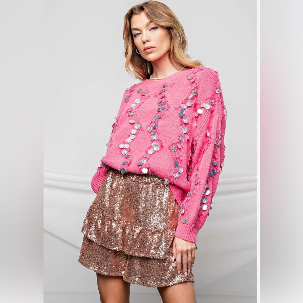 Brand new boutique style sparkle and shine front sweater